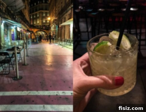Lisbon Revealed: Your Guide to Stays, Bites, and Sights 22 A vibrant pink-painted street with an interesting mural
