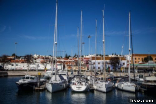 Lisbon Revealed: Your Guide to Stays, Bites, and Sights 26 View of the Tagus River with boats and the 25 de Abril Bridge in the background