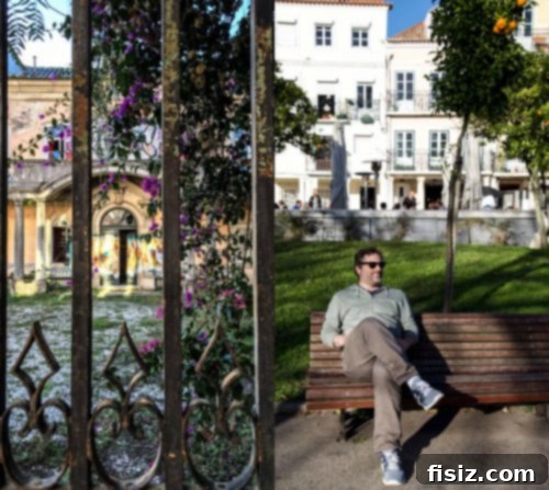 Lisbon Revealed: Your Guide to Stays, Bites, and Sights 27 People walking along the waterfront promenade in Belém