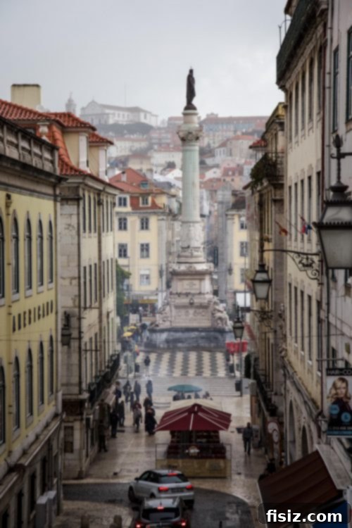 Lisbon Revealed: Your Guide to Stays, Bites, and Sights 30 A tram passing by historic buildings in Lisbon's old town