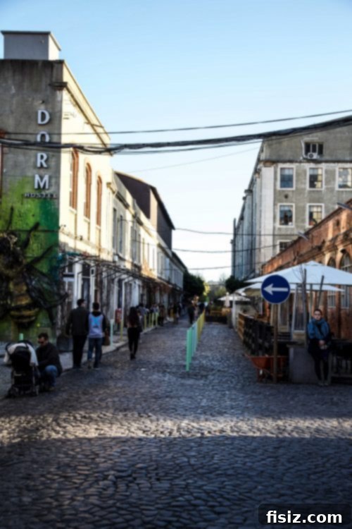 Lisbon Revealed: Your Guide to Stays, Bites, and Sights 34 Outdoor view of LX Factory, an industrial-chic creative district