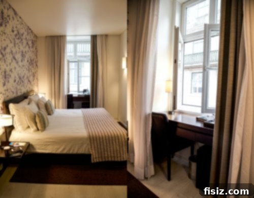 Lisbon Revealed: Your Guide to Stays, Bites, and Sights 7 Bathroom with a sleek design and rain shower head