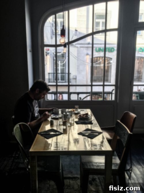 Lisbon Revealed: Your Guide to Stays, Bites, and Sights 10 Assortment of fresh bread and pastries at a breakfast buffet