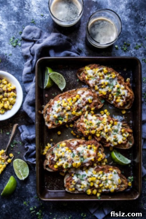 Crispy BBQ Chicken Toasts with Smoky Corn & Bacon 2 Delicious Pulled BBQ Chicken Toasts with Smoky Corn Bacon on a serving platter