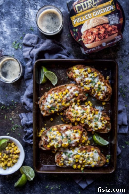 Crispy BBQ Chicken Toasts with Smoky Corn & Bacon 5 Assembled Pulled BBQ Chicken Toasts before broiling, showing layers of ingredients