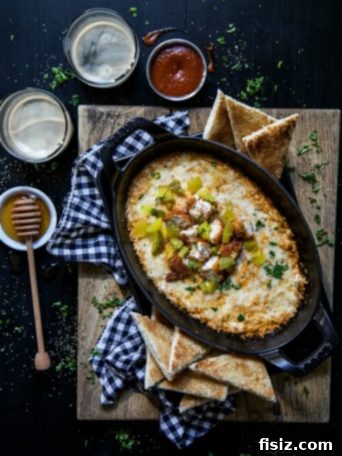 Sweet Heat Chicken Dip with Honey Butter Toasts 2 Hot Chicken Dip with Honey Toasts, a perfect party appetizer.