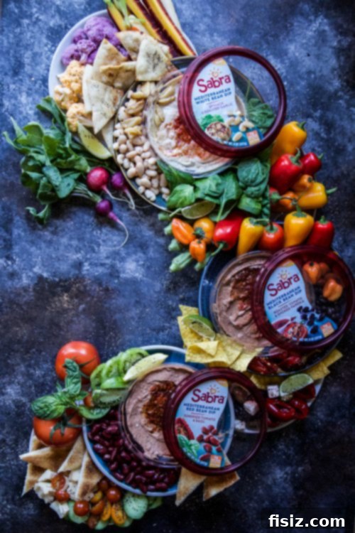 Mediterranean Bean Mezze Platter 6 Overhead shot of a full Mediterranean Bean Dip Platter, showcasing all the ingredients arranged beautifully.