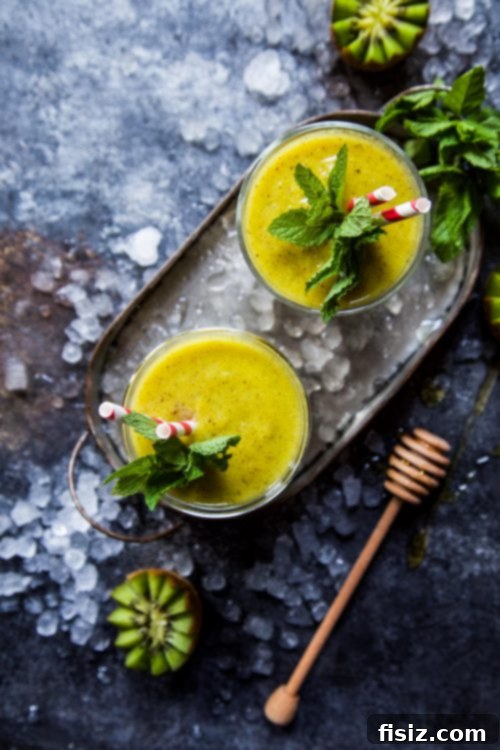 Vibrant Turmeric Pineapple Kiwi Mint Smoothie 2 Vibrant Kiwi Pineapple Turmeric Smoothie with Fresh Mint