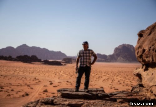 Journey to Wadi Rum Your Essential Guide to Sleeping Eating and Exploring the Martian Landscape 21 Bedouin guide pointing out sights in Wadi Rum