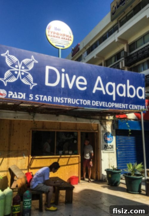 Aqaba Jordan Your Essential Travel Guide 18 Scuba diver exploring a vibrant coral reef in Aqaba, Red Sea