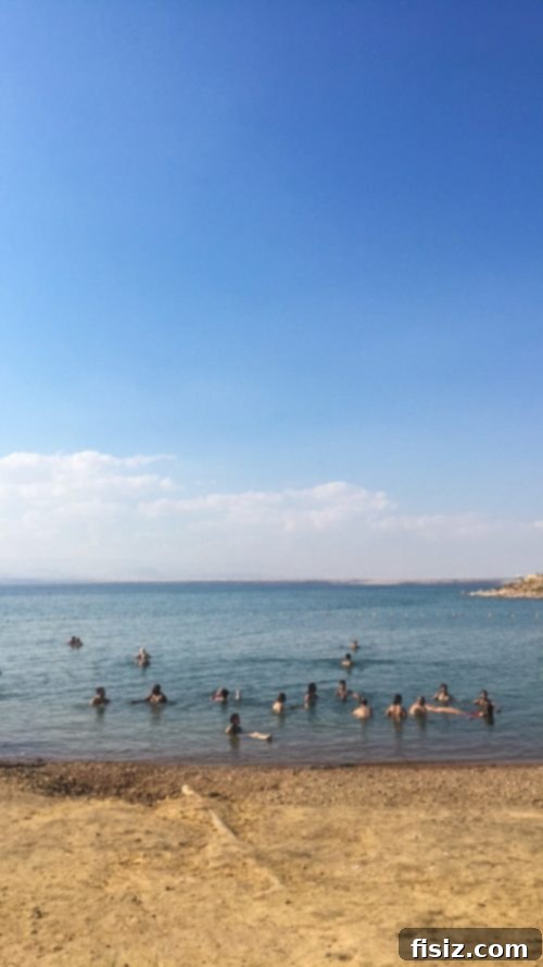 Dead Sea Jordan Accommodations Dining and Attractions 17 A person effortlessly floating on their back in the Dead Sea