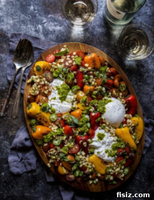 Golden Turmeric Pepper Caprese 6 Pepper Caprese Salad with Turmeric Dressing on a plate