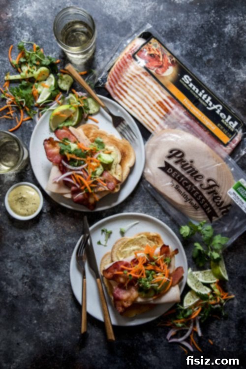 Thai Turkey Bacon Stack with Green Curry Aioli 7 Close-up of a delicious Thai Turkey Bacon Stack sandwich