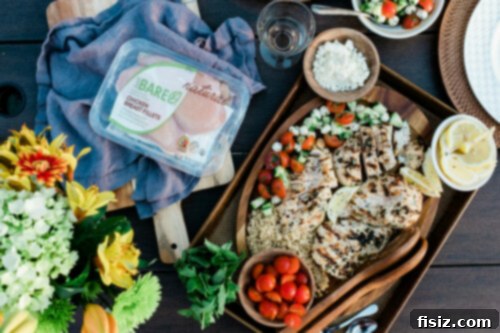 Tahini Grilled Chicken with Fresh Cucumber Caprese 10 A final shot of sliced Tahini Marinated Grilled Chicken Breasts with Cucumber Caprese Salad, ready to be served on a platter.