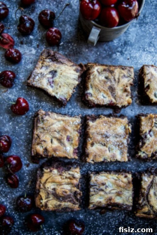 Cherry Cardamom Chocolate Brownies Giveaway 2 Delicious Cherry Cardamom Chocolate Brownies with a glossy chocolate top and vibrant cherry swirls