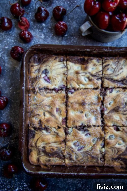 Cherry Cardamom Chocolate Brownies Giveaway 5 A baking dish filled with Cherry Cardamom Chocolate Brownies, freshly baked and cooling
