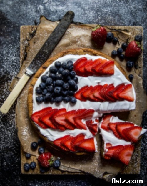 Stars & Stripes Cookie Cake with Fluffy Marshmallow Topping 5 Table setting for a Fourth of July celebration with the American Flag Cookie Cake.