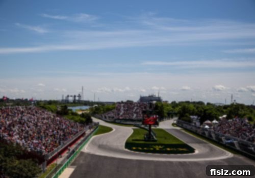 Formula 1 car skillfully navigating a sharp turn on the track at high speed.