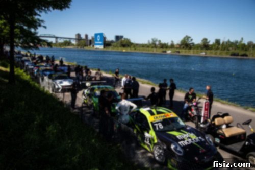 Support race cars, including a Ferrari Challenge vehicle, speeding around the track.