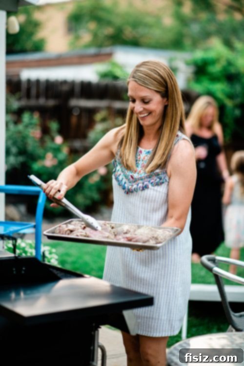 Zesty Grilled Butterflied Leg of Lamb 5 Friends laughing and enjoying an outdoor summer gathering