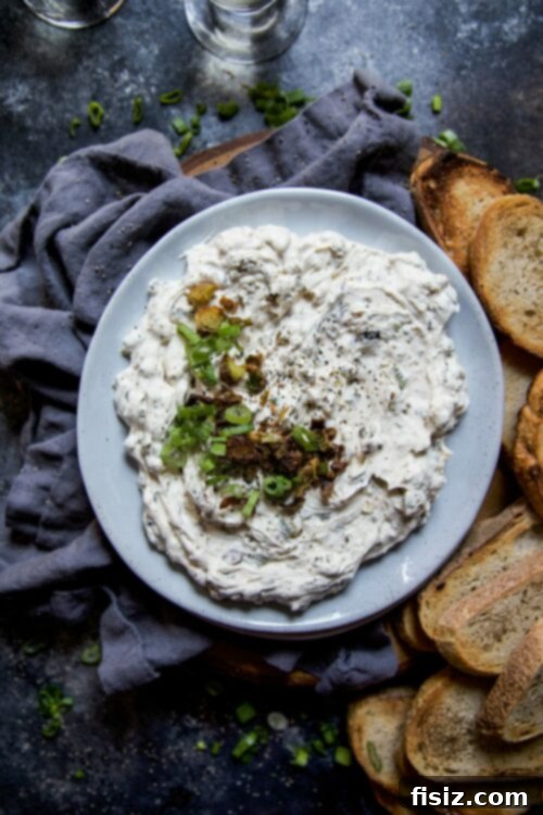 Creamy Labneh and Scallion Dip 2 Creamy Labneh Scallion Dip served with fresh baguette slices