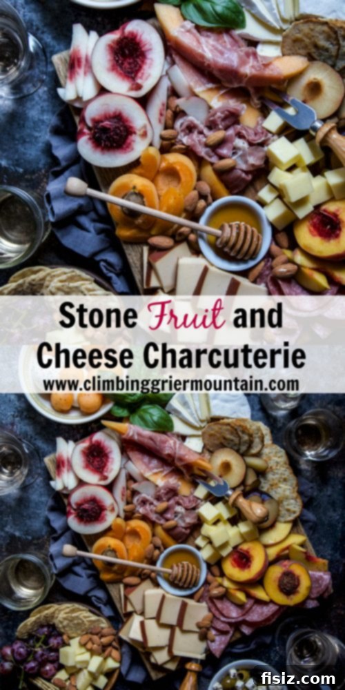 A final full shot of the beautifully arranged stone fruit and cheese charcuterie board.