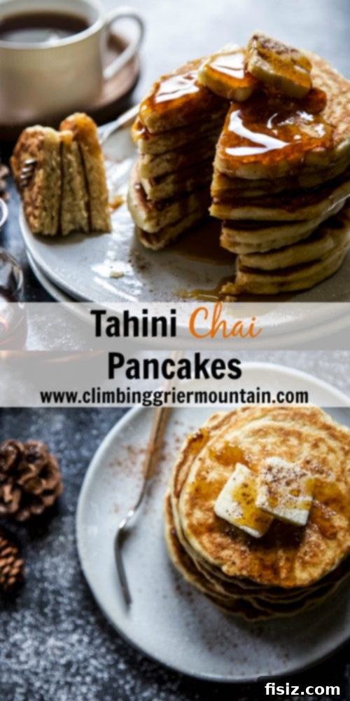 Golden Tahini Chai Pancakes 7 A beautifully composed flat lay of a stack of Tahini Chai Pancakes, surrounded by maple syrup and other breakfast elements.