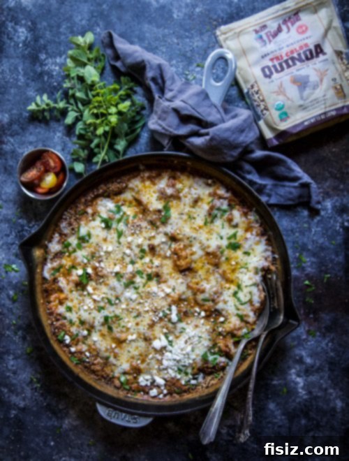 One-Pan Shawarma Chicken Quinoa Bake 4 Closeup of Chicken Shawarma Quinoa Skillet Bake with chicken, quinoa, and melted cheese