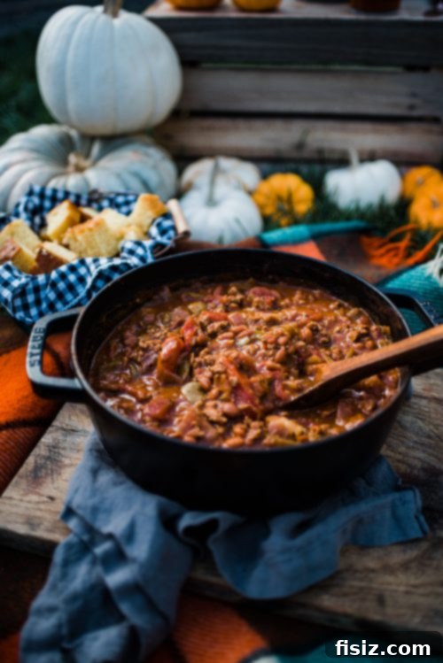 Legendary Lamb Chili 4 Fresh ingredients laid out for making Ultimate Lamb Chili: garlic, onions, bell peppers, and spices.