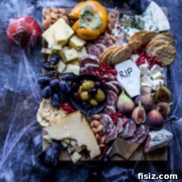 Deathly Hallows Halloween Charcuterie Board, a gourmet spooky snack spread.