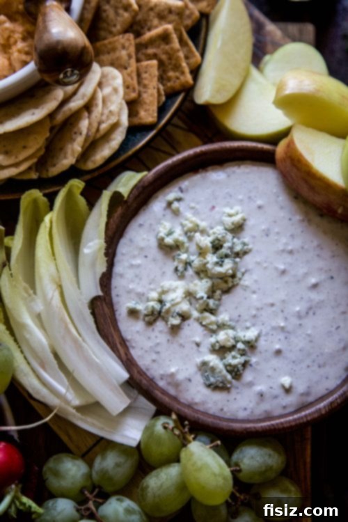 Three Easy Make-Ahead Dips 4 Close-up of a delicious homemade dip served with various dippers.