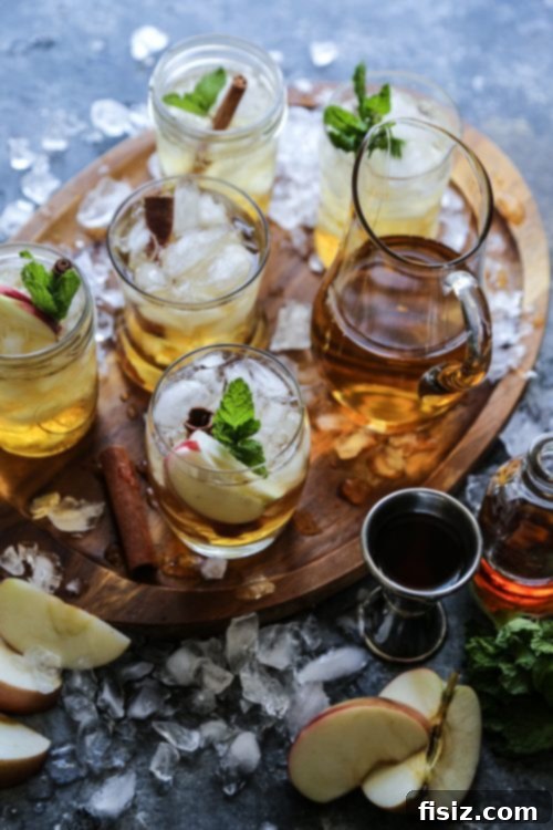 Autumn Apple Mojito 5 Ingredients for Harvest Cider Mojito laid out on a wooden board