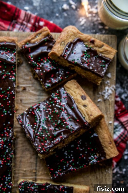 Peppermint Chocolate Chip Cookie Bars Close-up of freshly baked Peppermint Chocolate Chip Cookie Bars with festive sprinkles