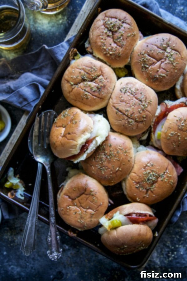 Italian Appetizer Sliders 12 A festive table spread, featuring Antipasto Sliders and celebratory drinks.