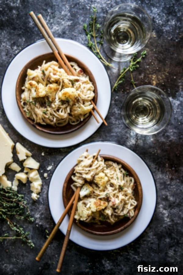 Roasted Cauliflower Udon Carbonara 5 Close-up of a serving of Roasted Cauliflower Carbonara with Udon Noodles on a plate