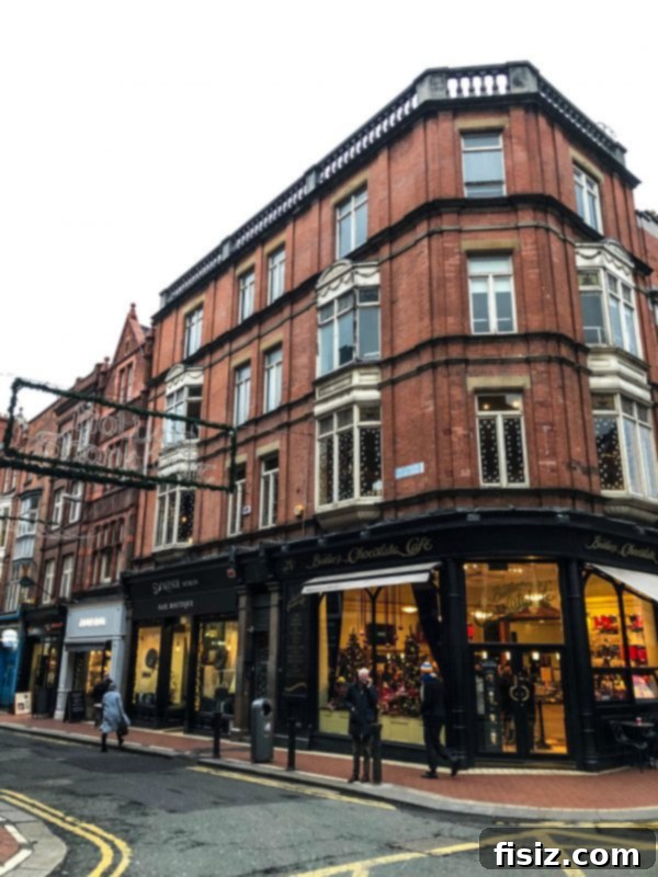 The Ultimate Dublin Guide Stay Dine and Explore Ireland's Capital 5 A busy street scene in Dublin with traditional buildings and vehicles