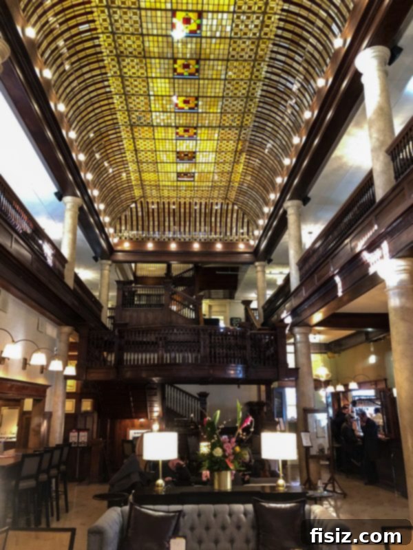 Ornate stained-glass ceiling in Hotel Boulderado lobby
