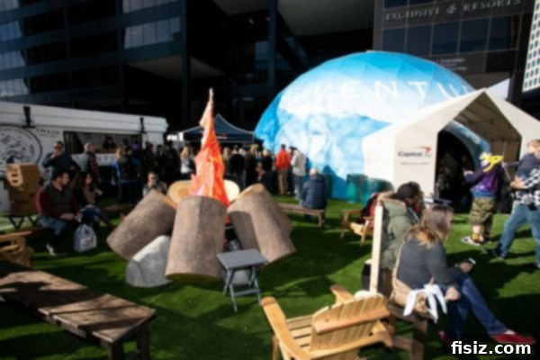 Vibrant outdoor area with various food stalls and a lively festive atmosphere at the Capital One Destination Venture Dome