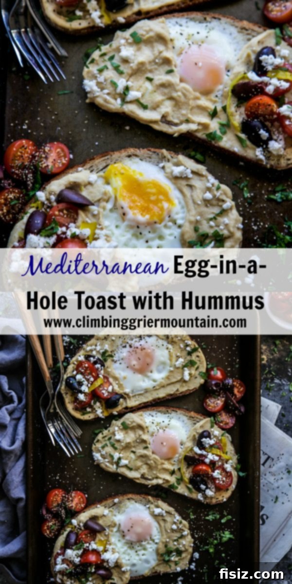 Mediterranean Egg Nest Toast with Hummus 7 Large overhead shot of Mediterranean Egg-in-a-Hole Toast, showcasing all the vibrant toppings