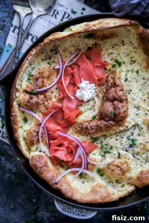 Everything Bagel Spiced Dutch Baby with Lox 3 Freshly baked Everything Bagel Dutch Baby in a cast iron skillet