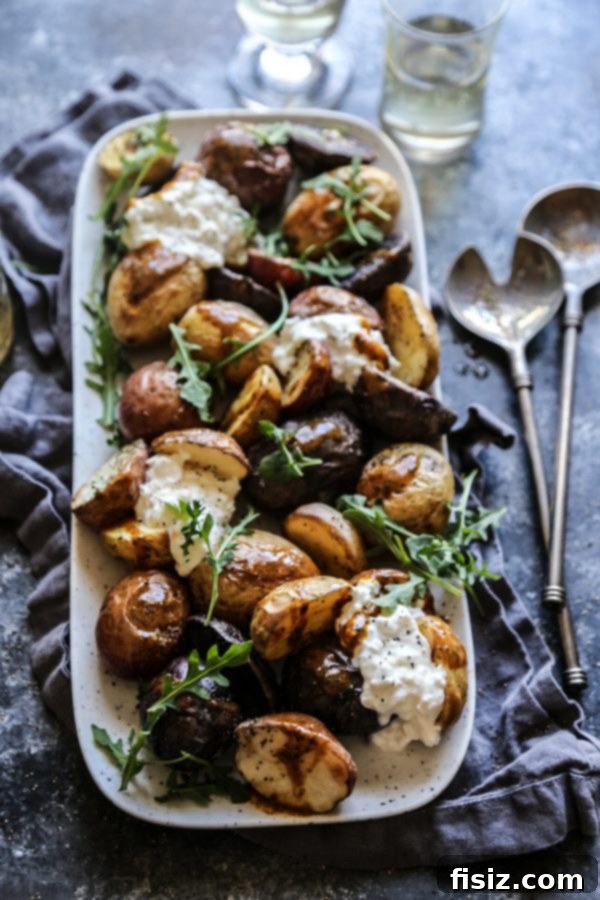 Zesty Tamarind Butter Roasted Spring Potatoes 6 Overhead shot of Spring Roasted Potatoes with Tamarind Butter in a serving dish.