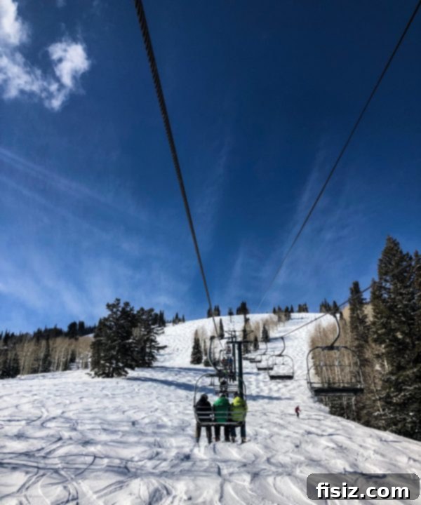 Deer Valley: The Ultimate Romantic Ski Getaway 11 Skiers riding a chairlift at Deer Valley
