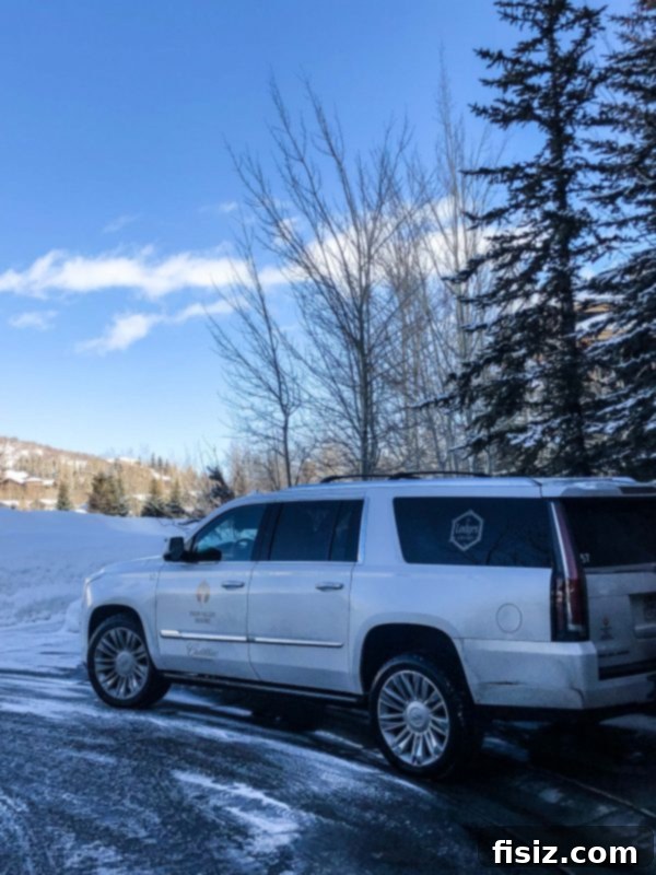 Deer Valley: The Ultimate Romantic Ski Getaway 9 Cadillac shuttle parked outside a luxury lodge