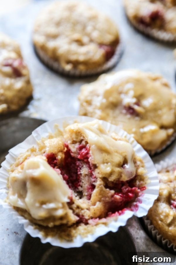 Golden Raspberry Oat Muffins with Honey Butter 5 Overhead view of Raspberry Oat Muffins, showing their fluffy texture