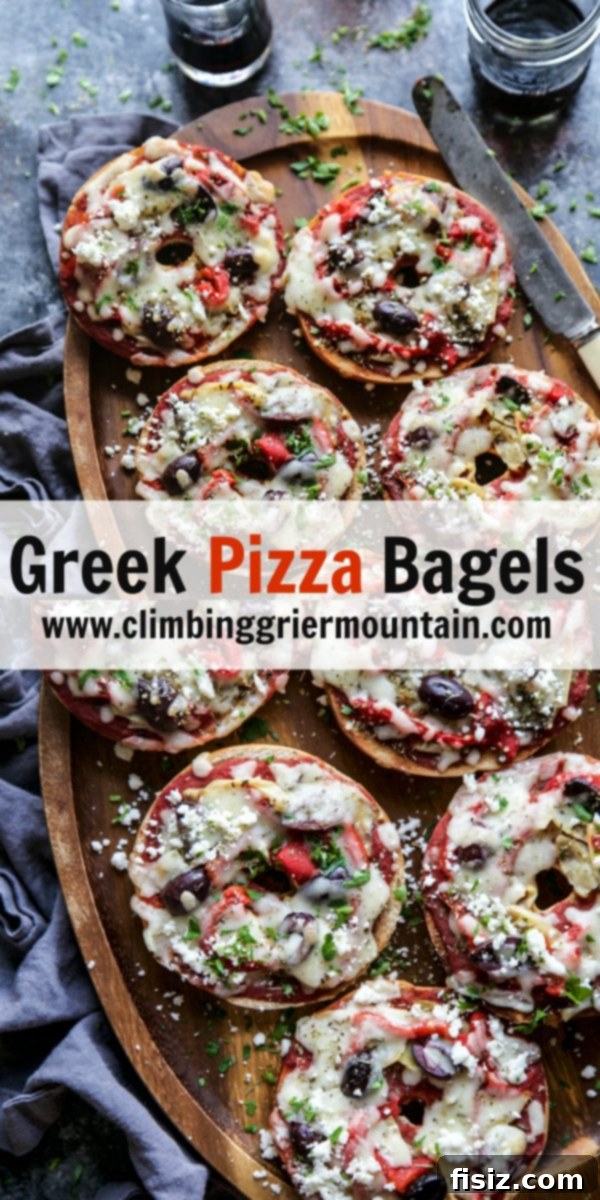 Stacked Greek Pizza Bagels, showcasing layers