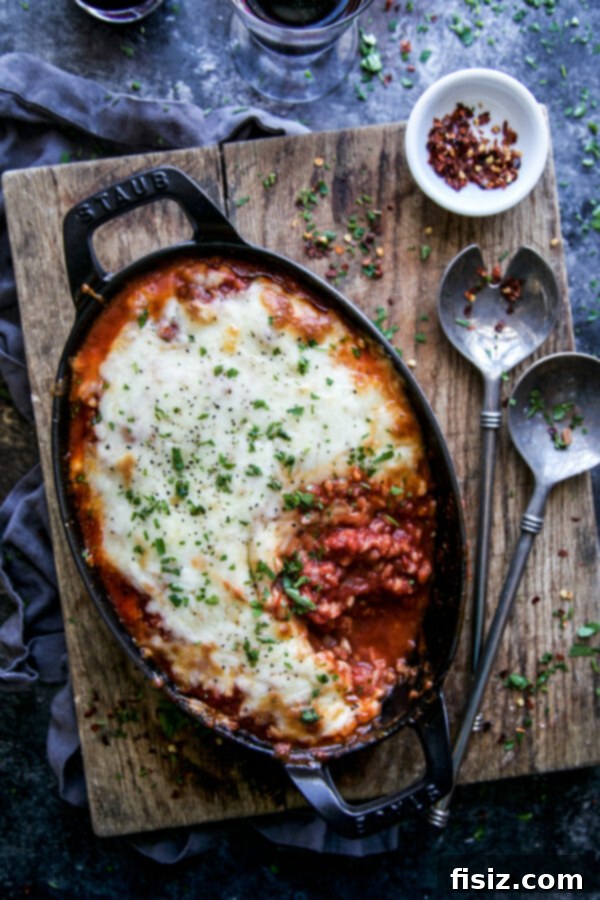 Mediterranean Roasted Red Pepper Farro Parmigiana 2 Roasted Red Pepper & Spiced Farro Parmigiana with a creamy sauce and melted cheese