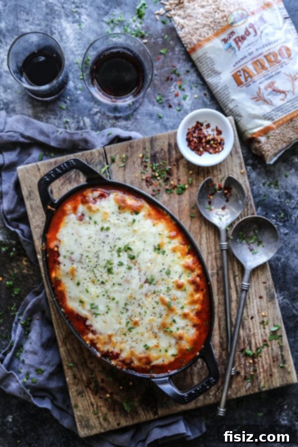 Mediterranean Roasted Red Pepper Farro Parmigiana 6 A serving of Roasted Red Pepper & Spiced Farro Parmigiana on a plate