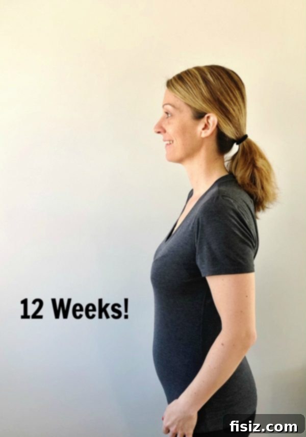 Trimester One The Start of Our Big Adventure 16 Pregnant woman enjoying a meal, a moment of self-care and nourishment.