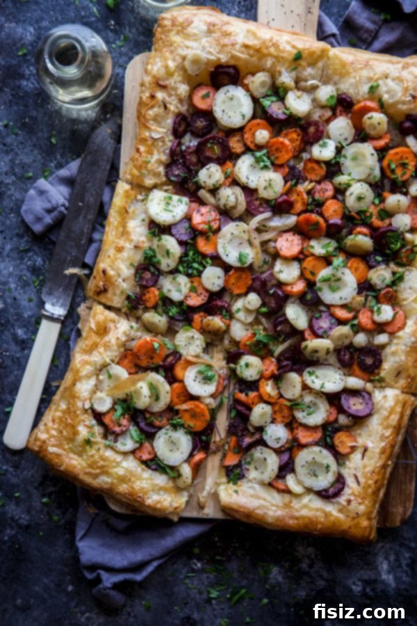 Golden Caramel Carrot Tart with Bright Dill 5 Caramelized Carrot Tart with Fresh Dill served on a white plate