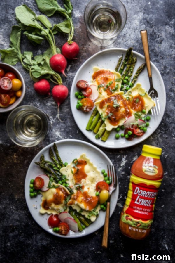 Smoky Dorothy Lynch Dressed Garden Veggie Ravioli 6 Plated Garden Veggie Ravioli with Smoky Dorothy Lynch Dressing, garnished with fresh basil and grated Parmesan